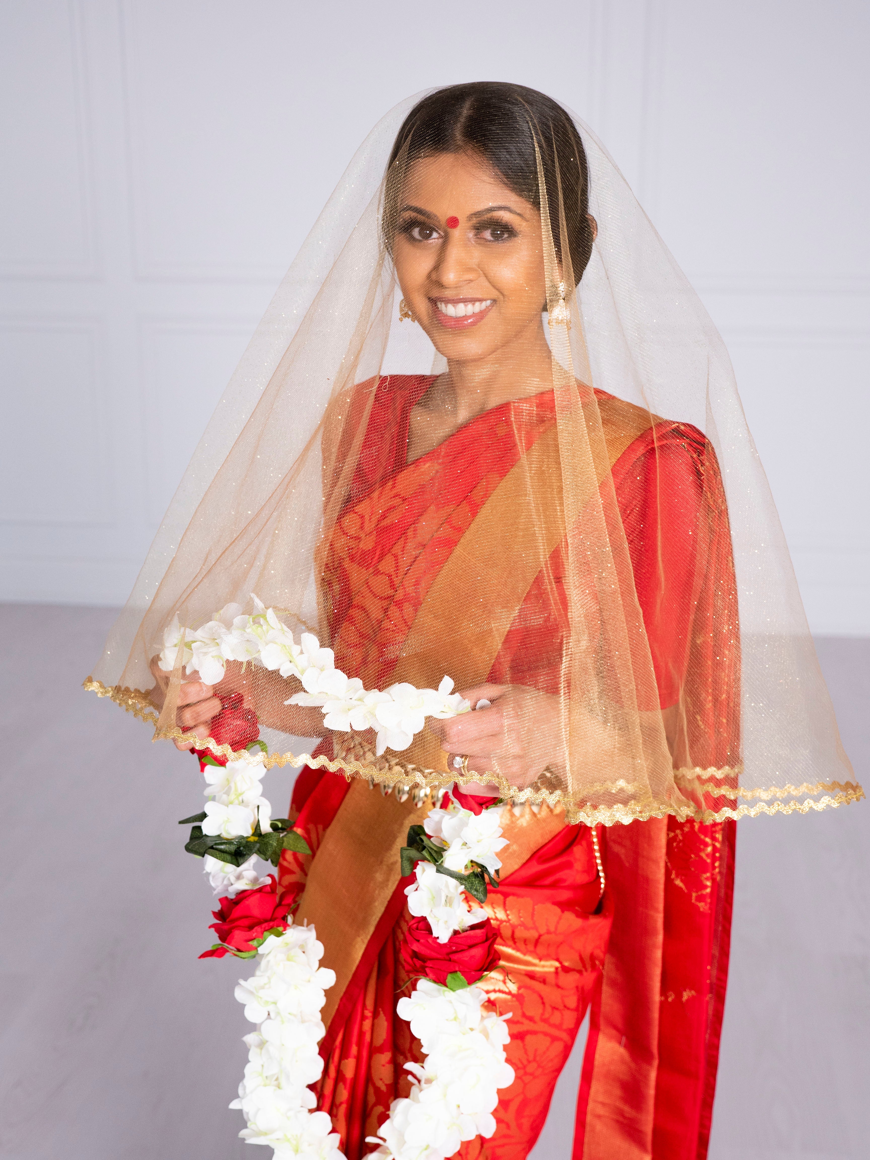 red saree wedding dress Photo of Bride in a red saree