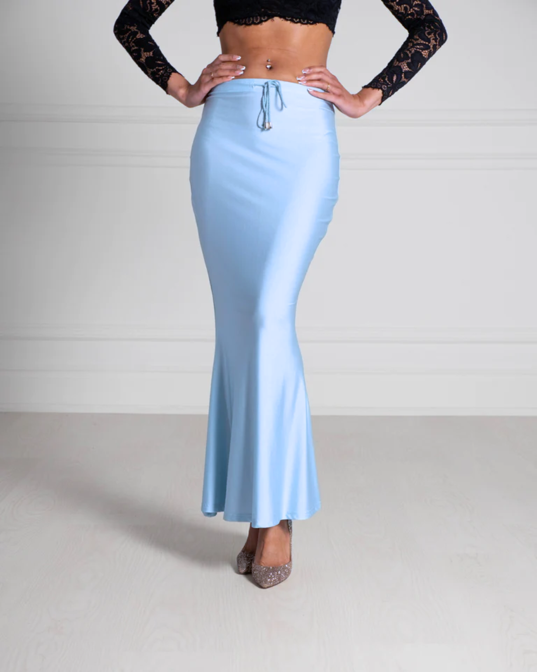 Blue Sky Saree Silhouette™ petticoat with a high waist and mermaid-style flare, designed to smooth the body and support any saree drape. Ideal underskirt for pleating, tucking and styling.