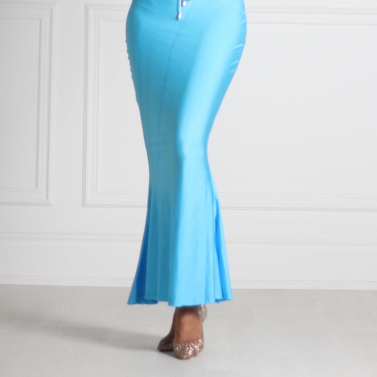 Clovia - Desi Diva! Flaunt your curves with saree shapewear. Designed with  targeted compression to smoothen out and give you a mermaid like silhouette  in a saree. Available in different colours and