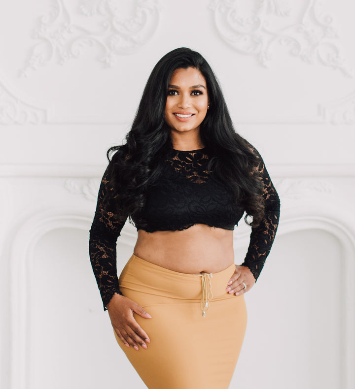 Black Lace Crop Top with floral pattern, scalloped edges and sheer sleeves, designed to pair with sarees or lehengas. Readymade, fully lined body with reversible neckline.